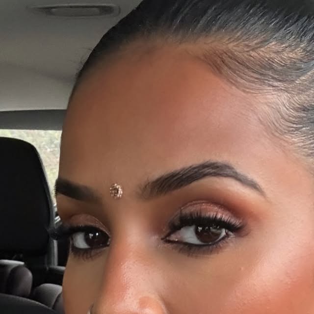 Soft bridal glam make-up with fluttery lashes and warm bronzed eyes