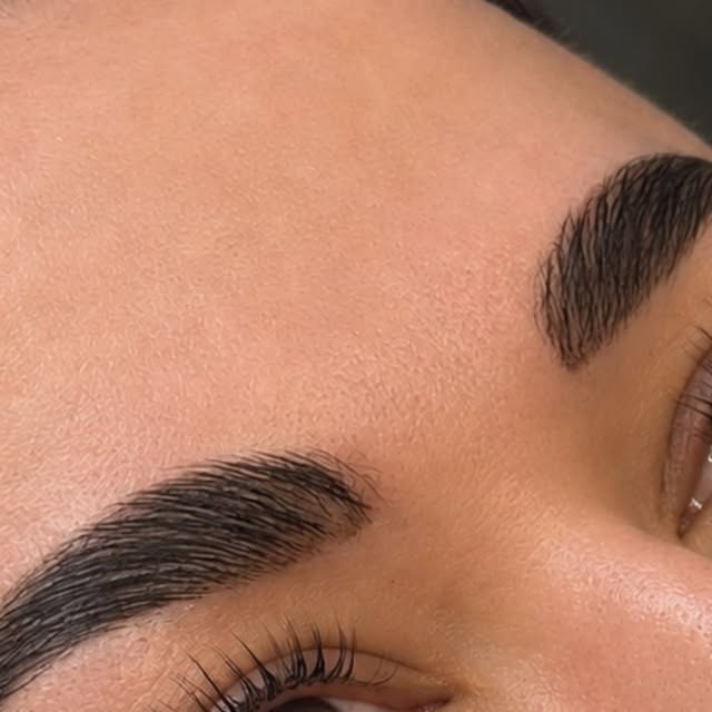 Laminated brows and lifted lashes close-up